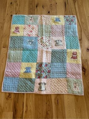 Land Of Nod Patchwork Baby Quilt in Pastel Blue, Pink, Yellow, Cream